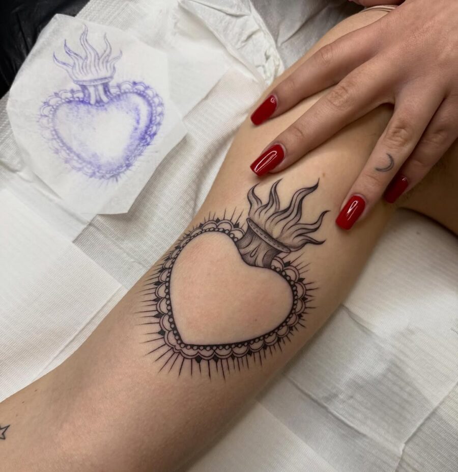 Intricate heart tattoo symbolizing peace and love Tattoo on skin