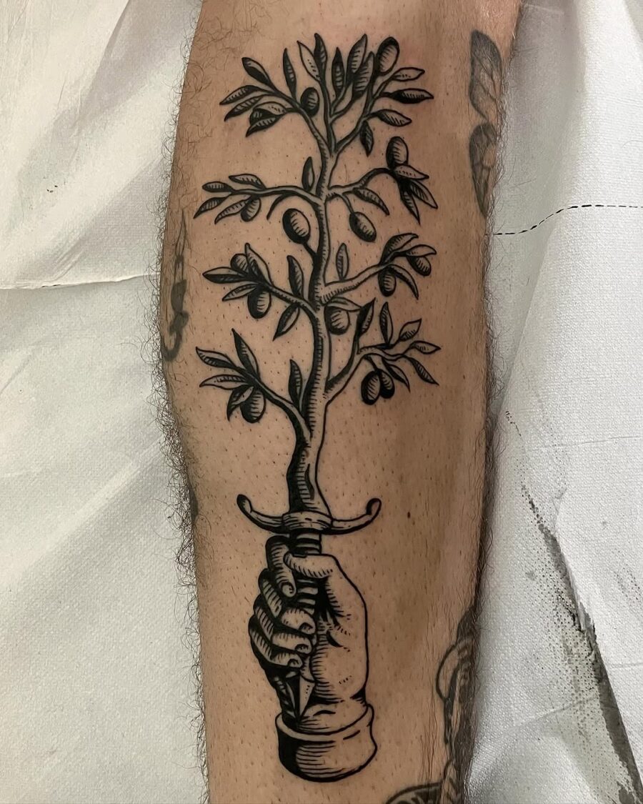 Symbolic olive branch peace tattoo design Tattoo on skin