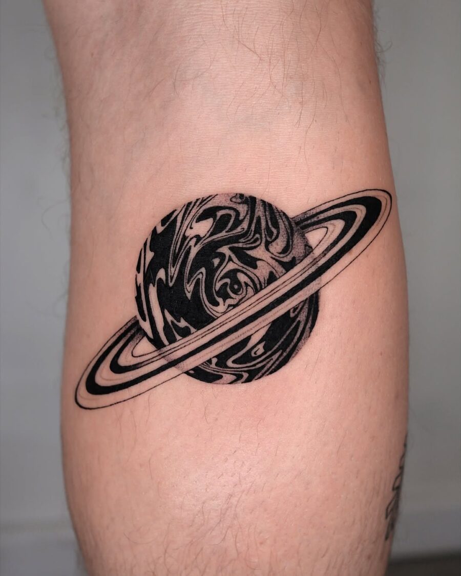 Unique Saturn tattoo symbolizing peace and harmony Tattoo on skin