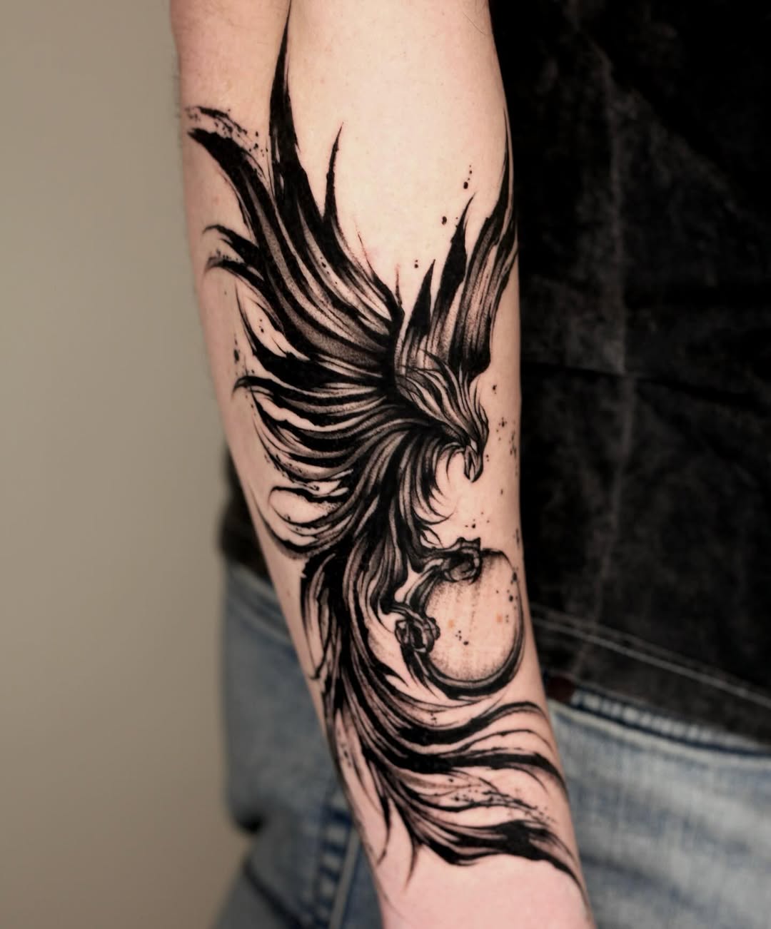 Intricate black ink phoenix tattoo design Tattoo on skin