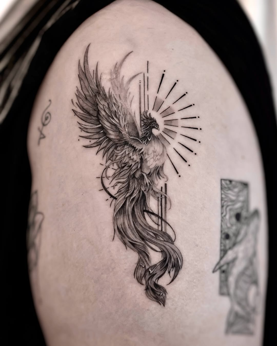 Stunning phoenix tattoo radiates power and rebirth Tattoo on skin