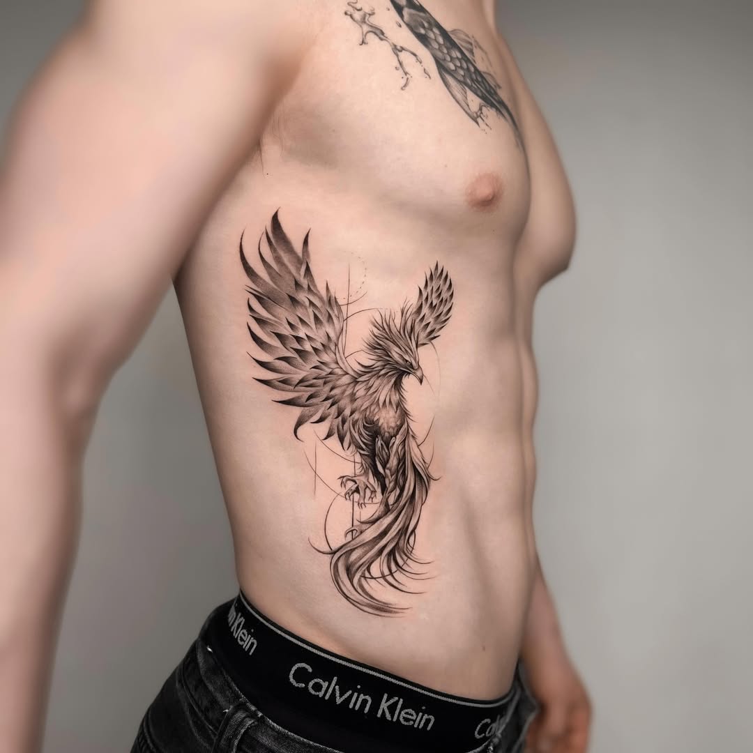 Vibrant phoenix tattoo showcasing rebirth symbolism Tattoo on skin