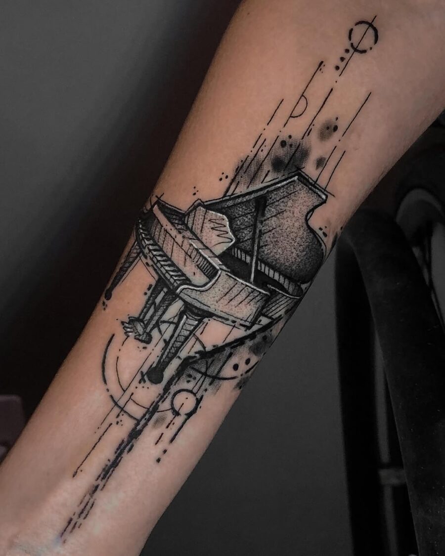 Elegant grand piano tattoo on the arm Tattoo on skin