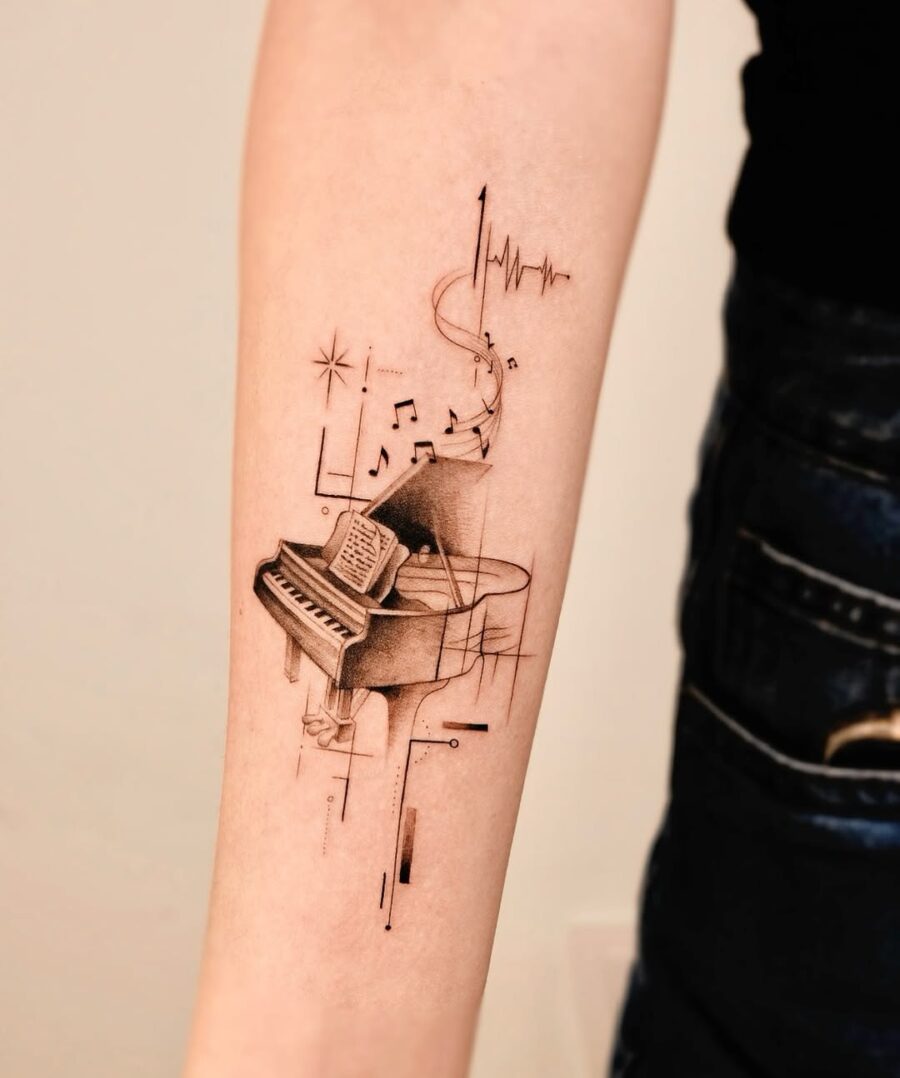 Elegantly crafted piano tattoo showcasing musical elements Tattoo on skin