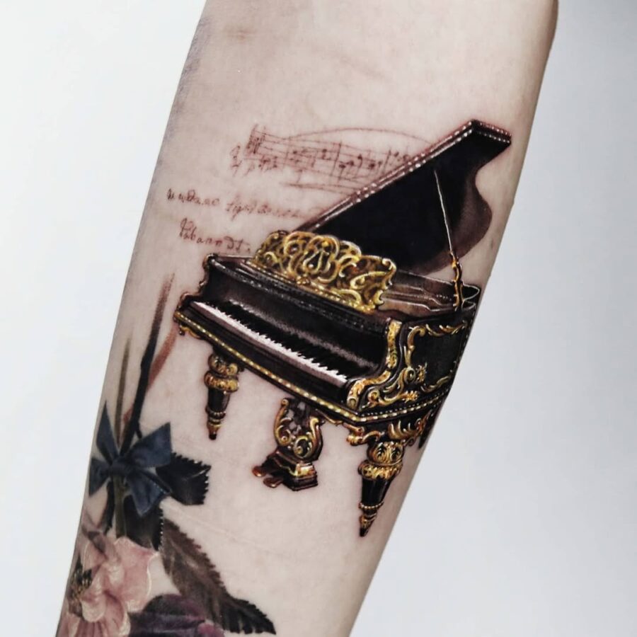 Stunning Detailed Piano Tattoo on Forearm Tattoo on skin