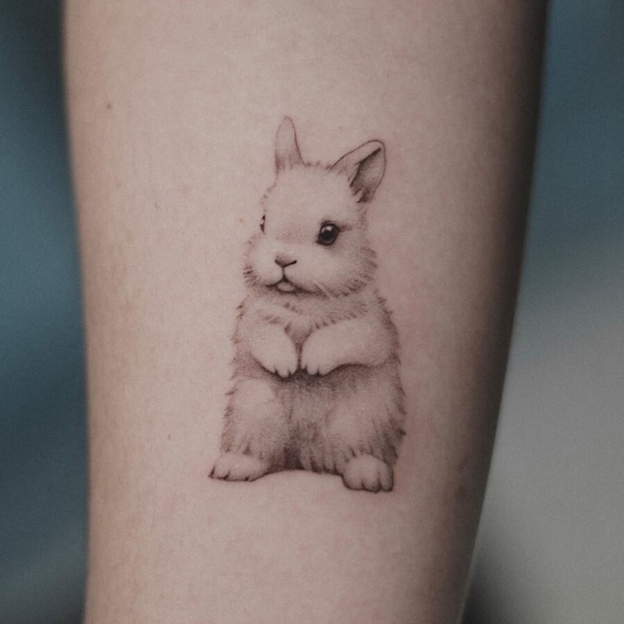 Charming Minimalist Rabbit Tattoo Design Tattoo on skin