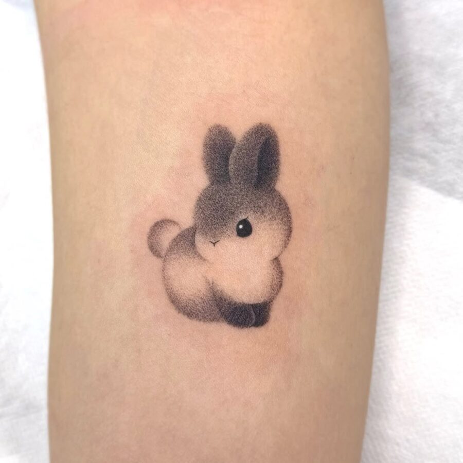 Charming minimalistic rabbit tattoo design Tattoo on skin