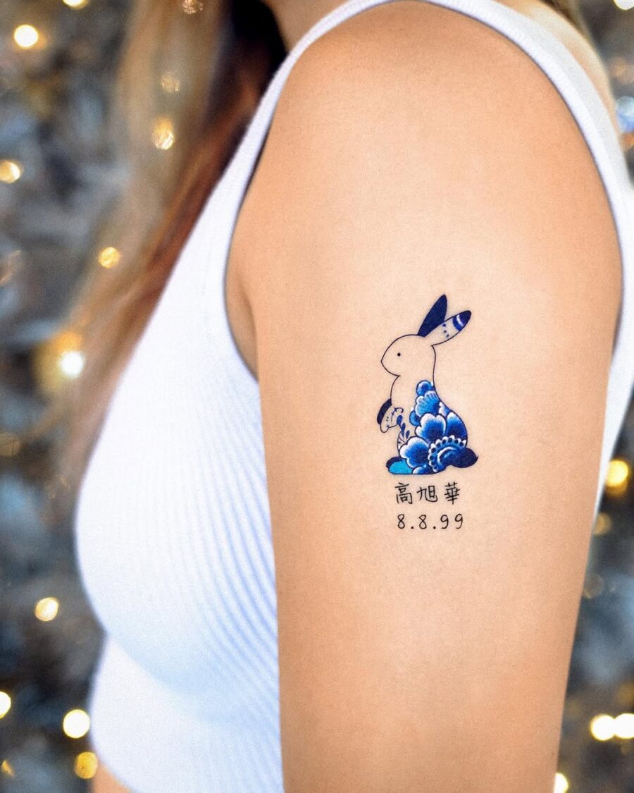 Charming rabbit tattoo with ocean vibes Tattoo on skin