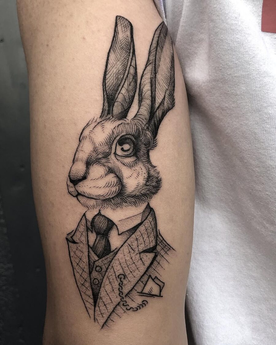 Stylish Rabbit Tattoo in Formal Attire Tattoo on skin