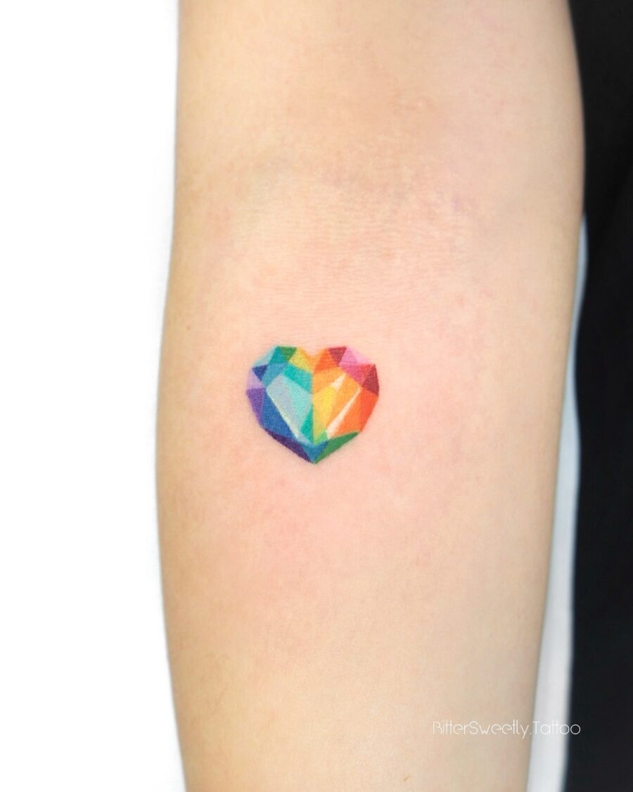 Vibrant heart tattoo symbolizing joy and hope Tattoo on skin