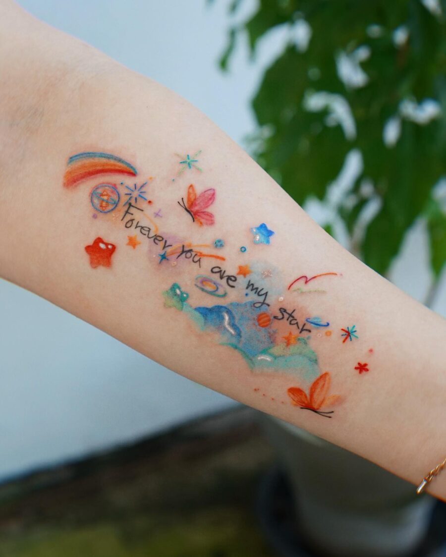 Vibrant rainbow baby tattoo celebrating love and hope Tattoo on skin