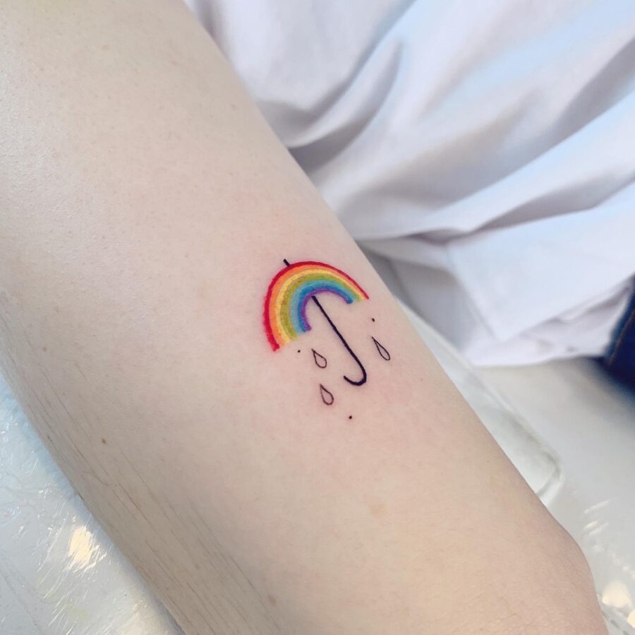 Vibrant rainbow umbrella tattoo for remembrance Tattoo on skin