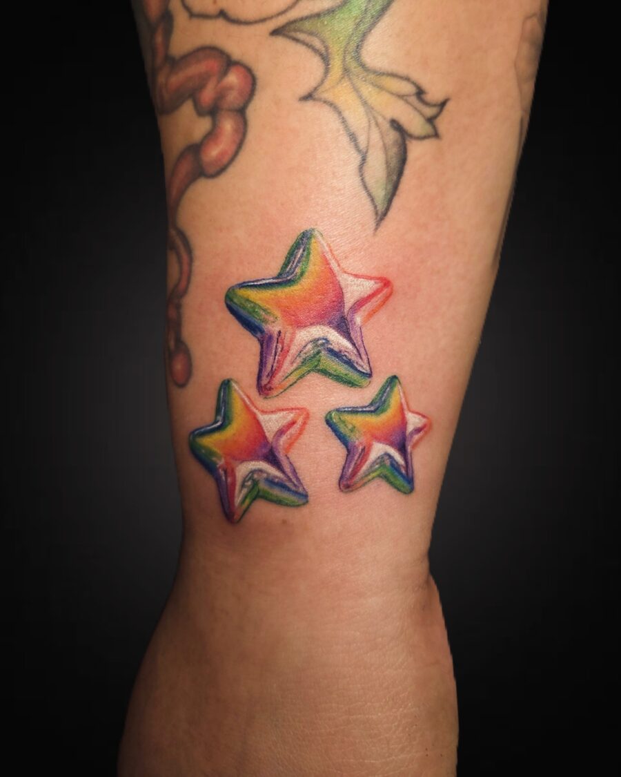 Vibrant stars embodying hope and remembrance Tattoo on skin