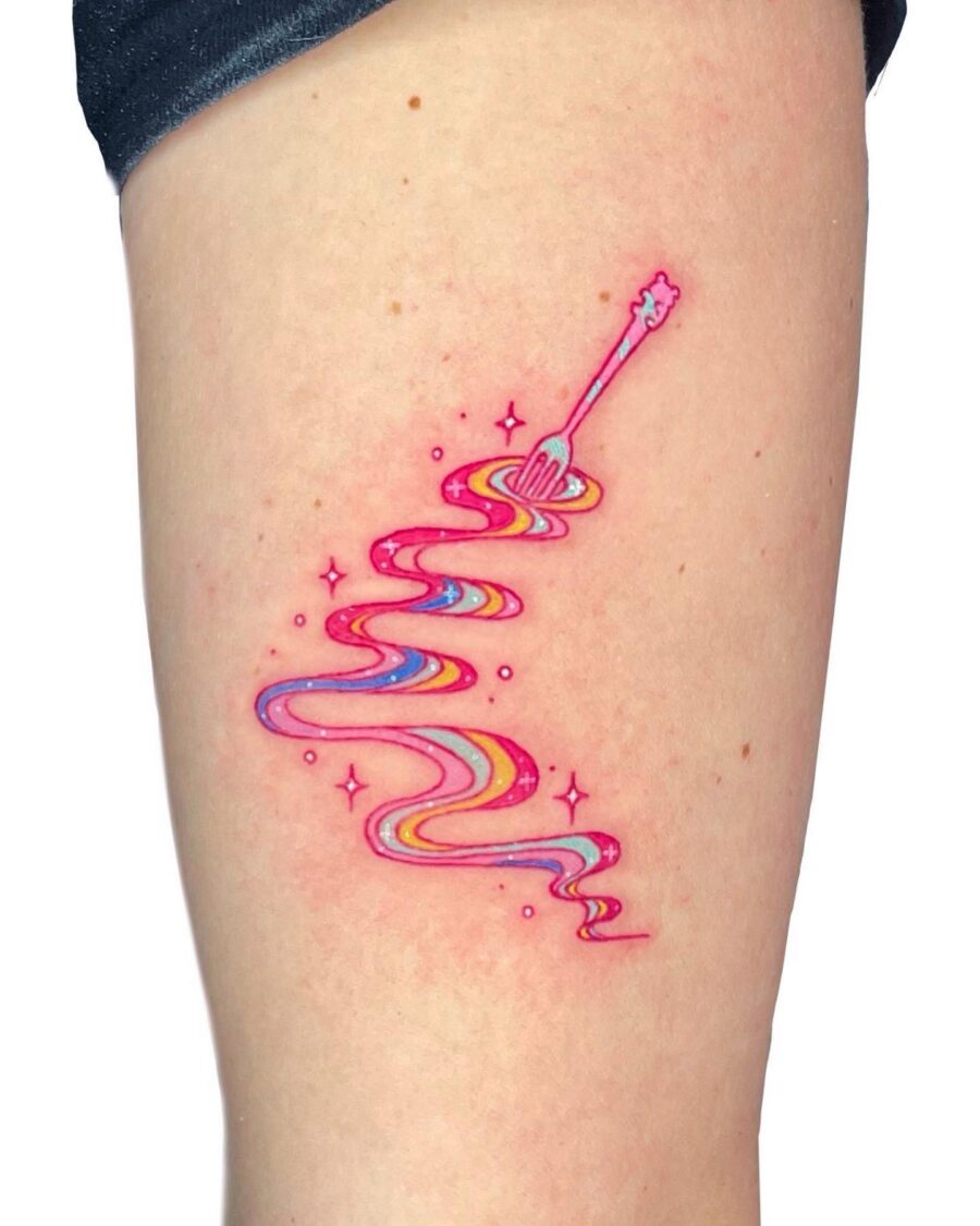 Whimsical Rainbow Tattoo with Magical Vibes Tattoo on skin