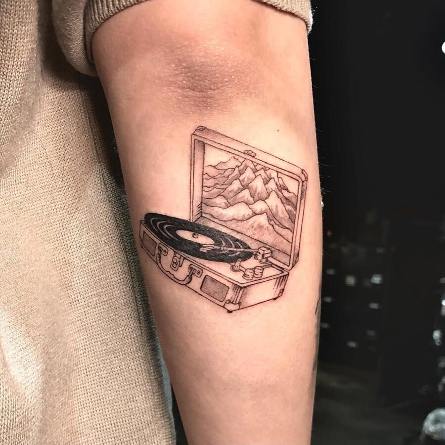 Artistic Tattoo of a Record Player Tattoo on skin
