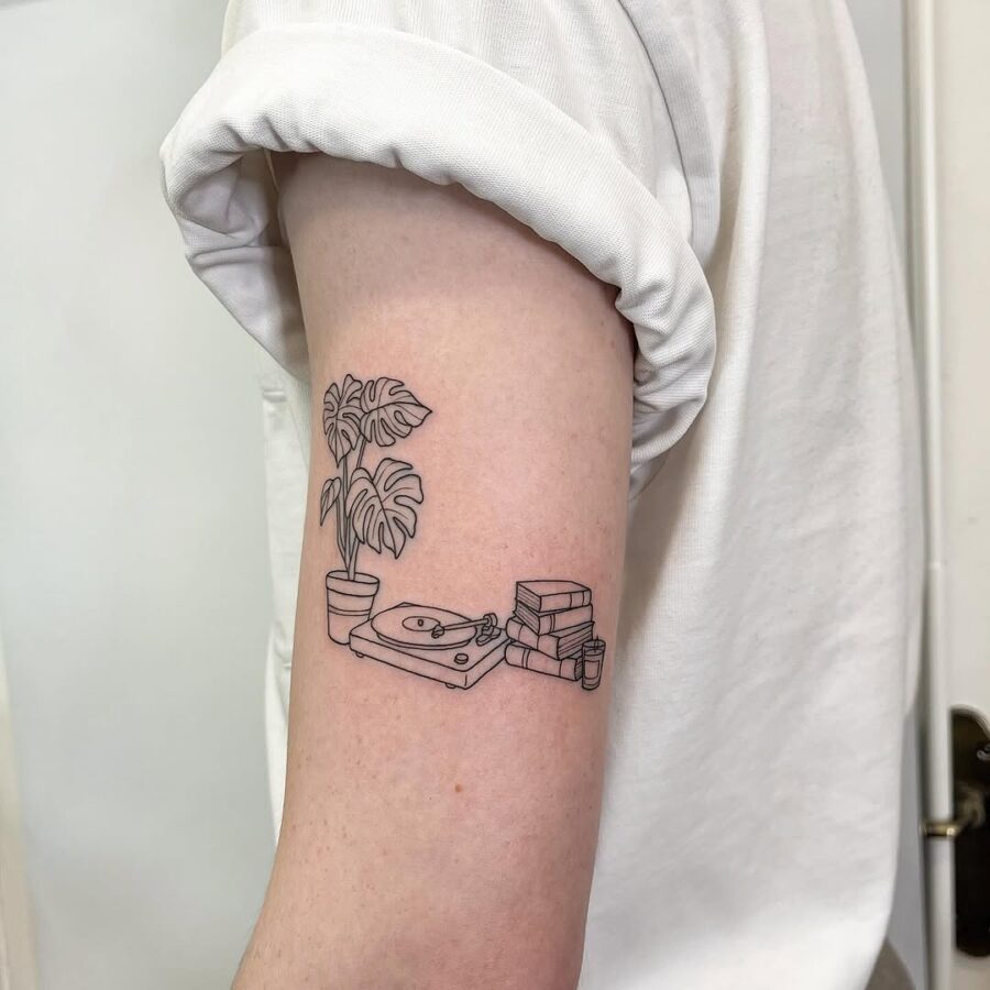 Charming minimalism in record player tattoo Tattoo on skin