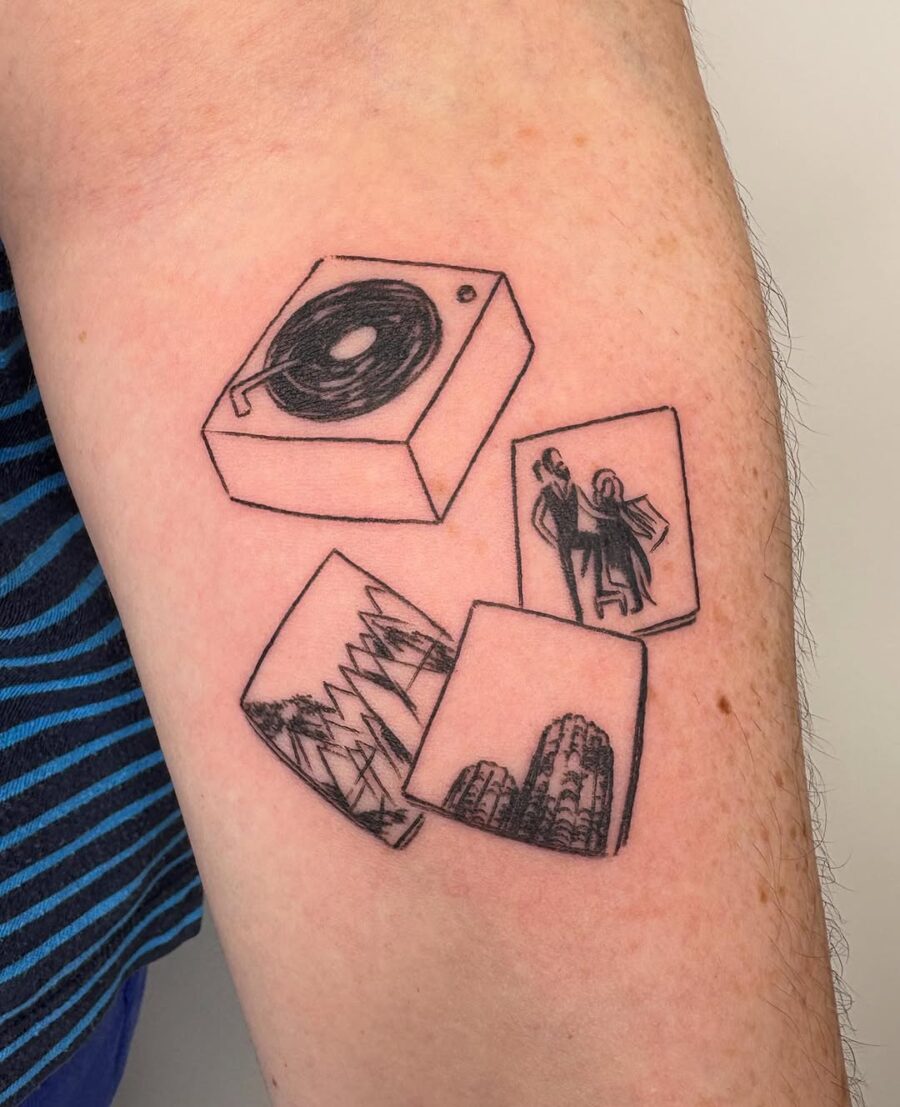 Charming record player tattoo with nostalgic vibes Tattoo on skin