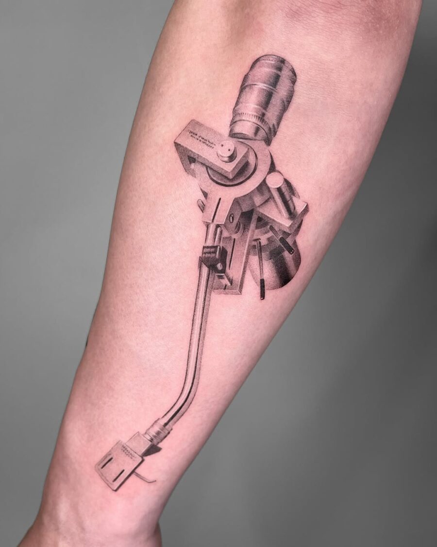 Intricate black and gray record player tattoo Tattoo on skin