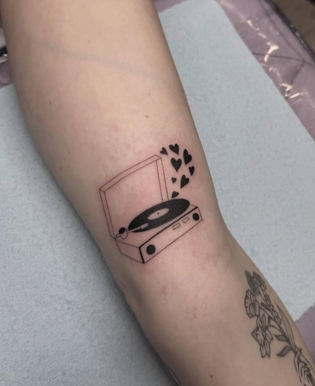 Minimalist record player tattoo with love vibes Tattoo on skin