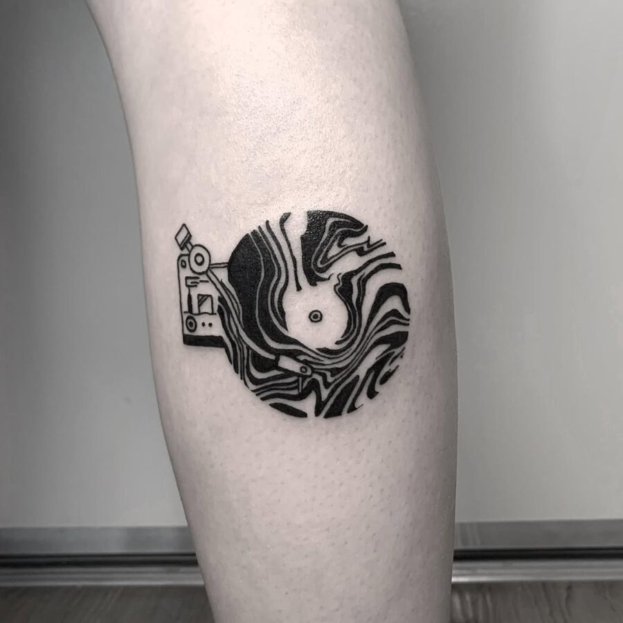 Stylish record player tattoo with abstract vibes Tattoo on skin