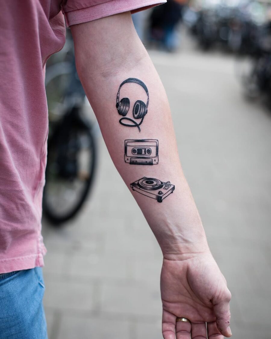 Stylish tribute to vintage music culture Tattoo on skin