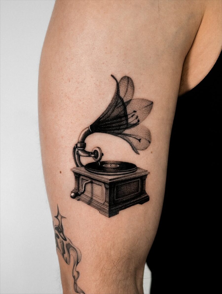 Stylish vintage record player tattoo design Tattoo on skin
