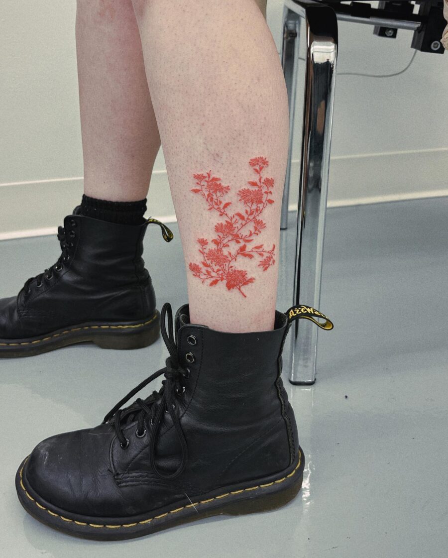 Bold Red Floral Tattoo on Leg Tattoo on skin