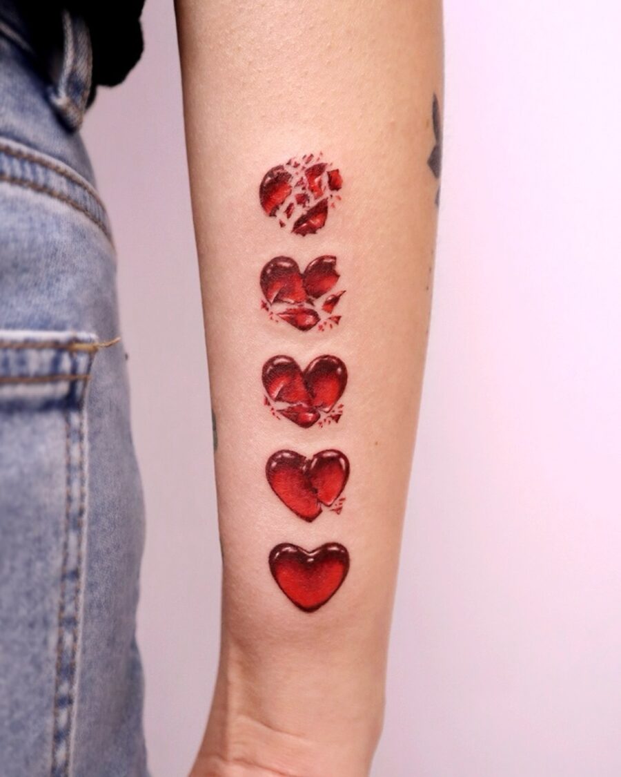 Intricate Red Heart Ink Tattoo Series Tattoo on skin