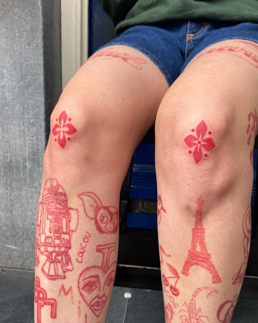 Vibrant red ink tattoo designs on legs Tattoo on skin
