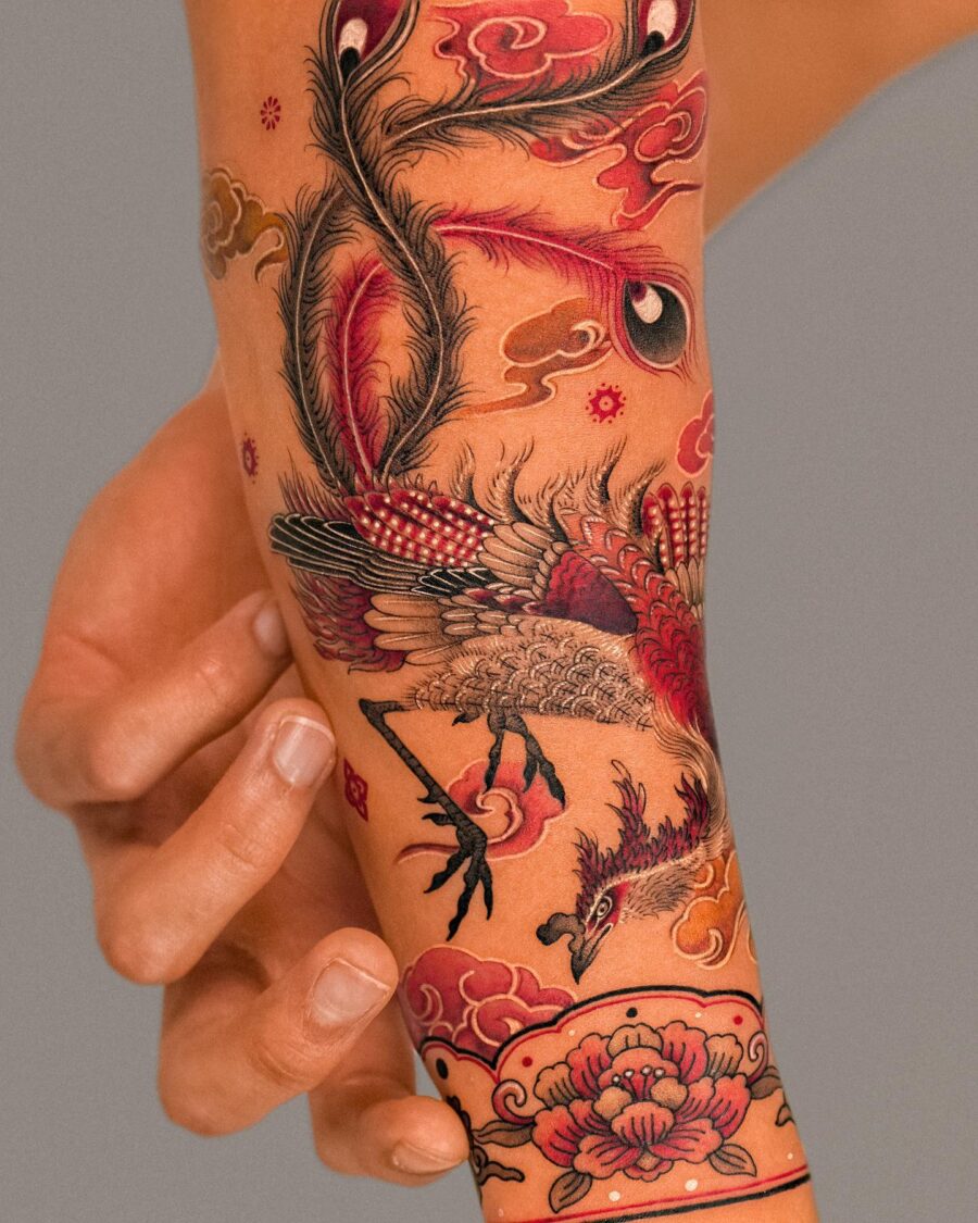 Vivid red ink crane tattoo design display Tattoo on skin