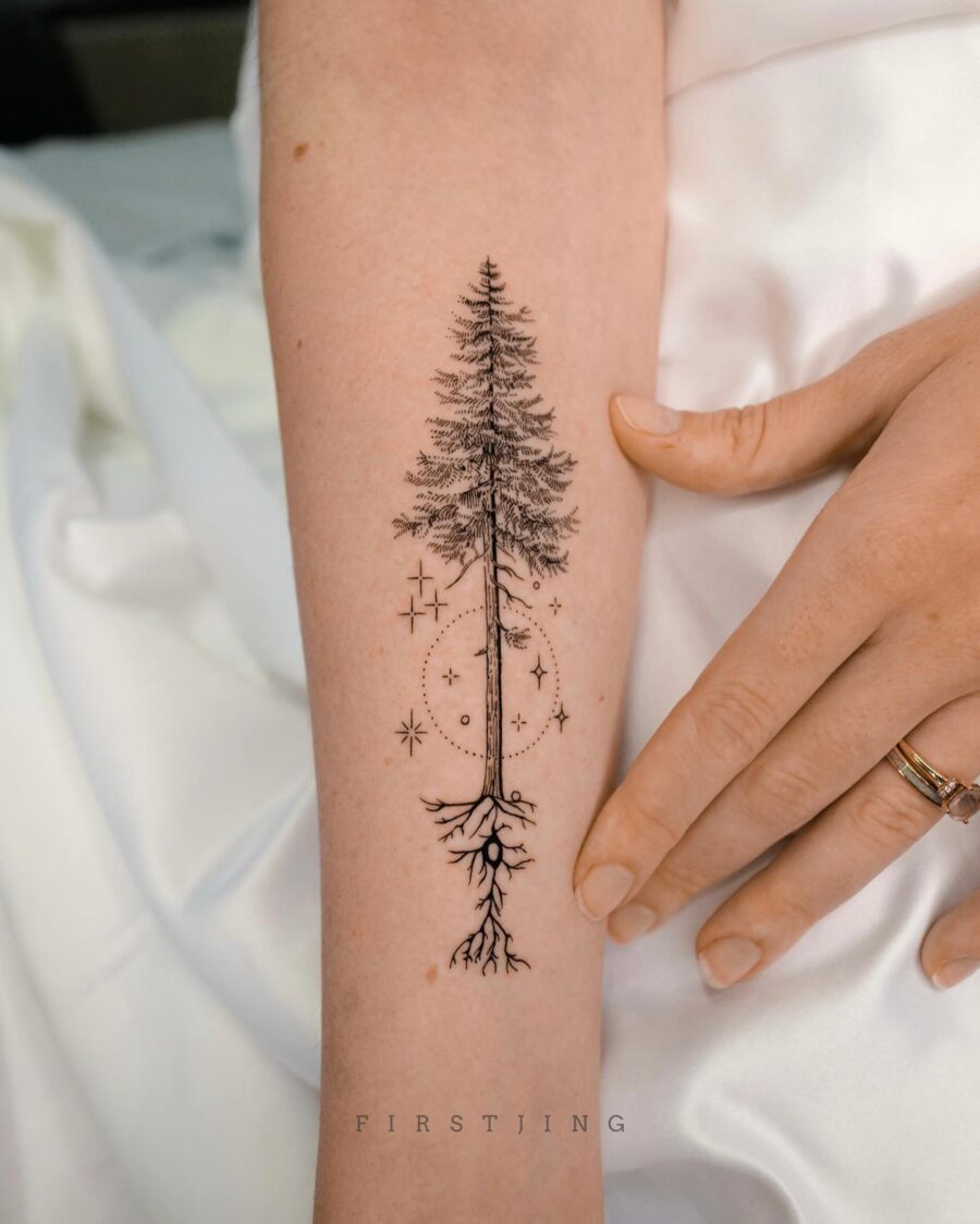 Elegant redwood tree tattoo with cosmic elements Tattoo on skin