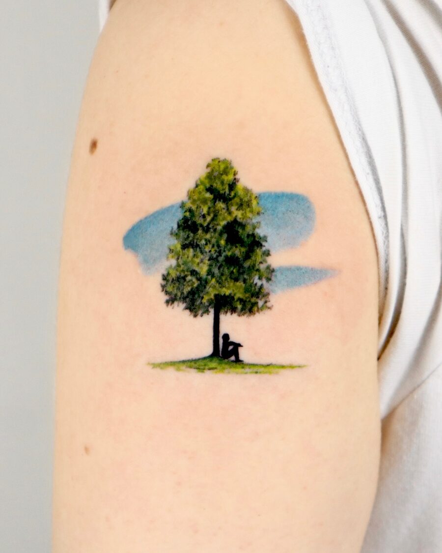 Sitting Under a Majestic Redwood Tree Tattoo on skin