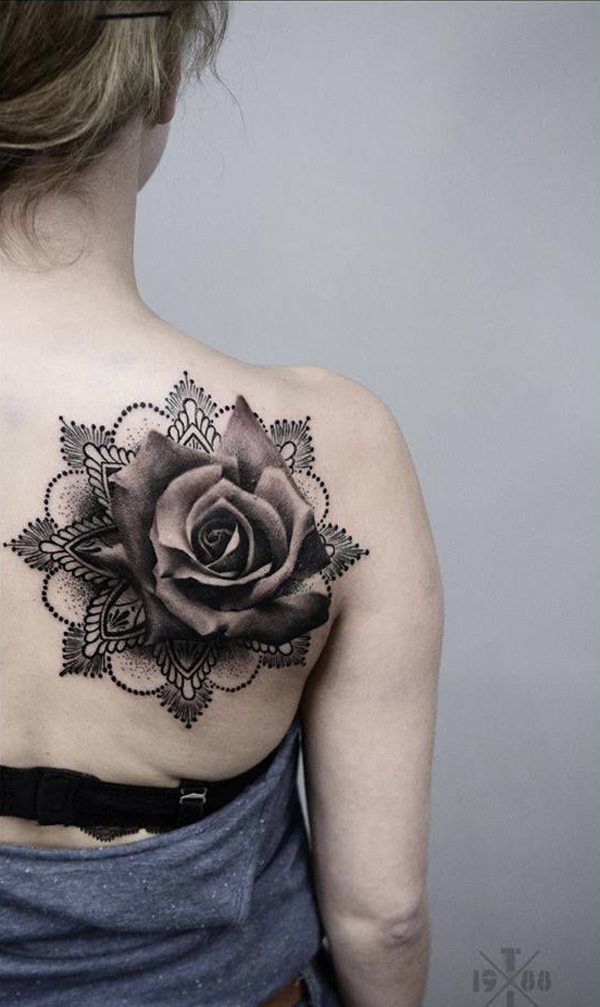 Black rose tattoo on back of girl&rsquo;s right shoulder Tattoo on skin