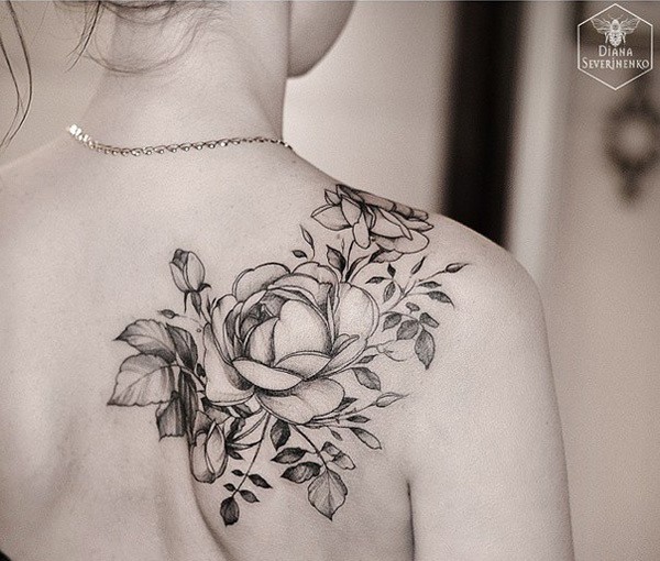 Flat black and gray rose bush Tattoo on skin
