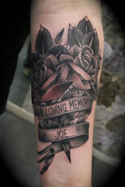 In loving memory Tattoo on skin