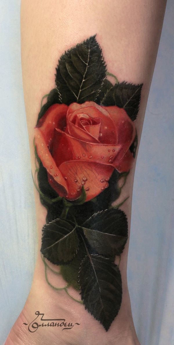 Rose tattoo on the back of wrist Tattoo on skin