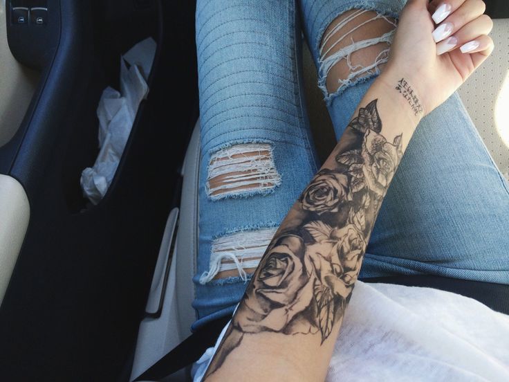 Several Rose Tattoo Flowers On A Girl&rsquo;s Arm Tattoo on skin