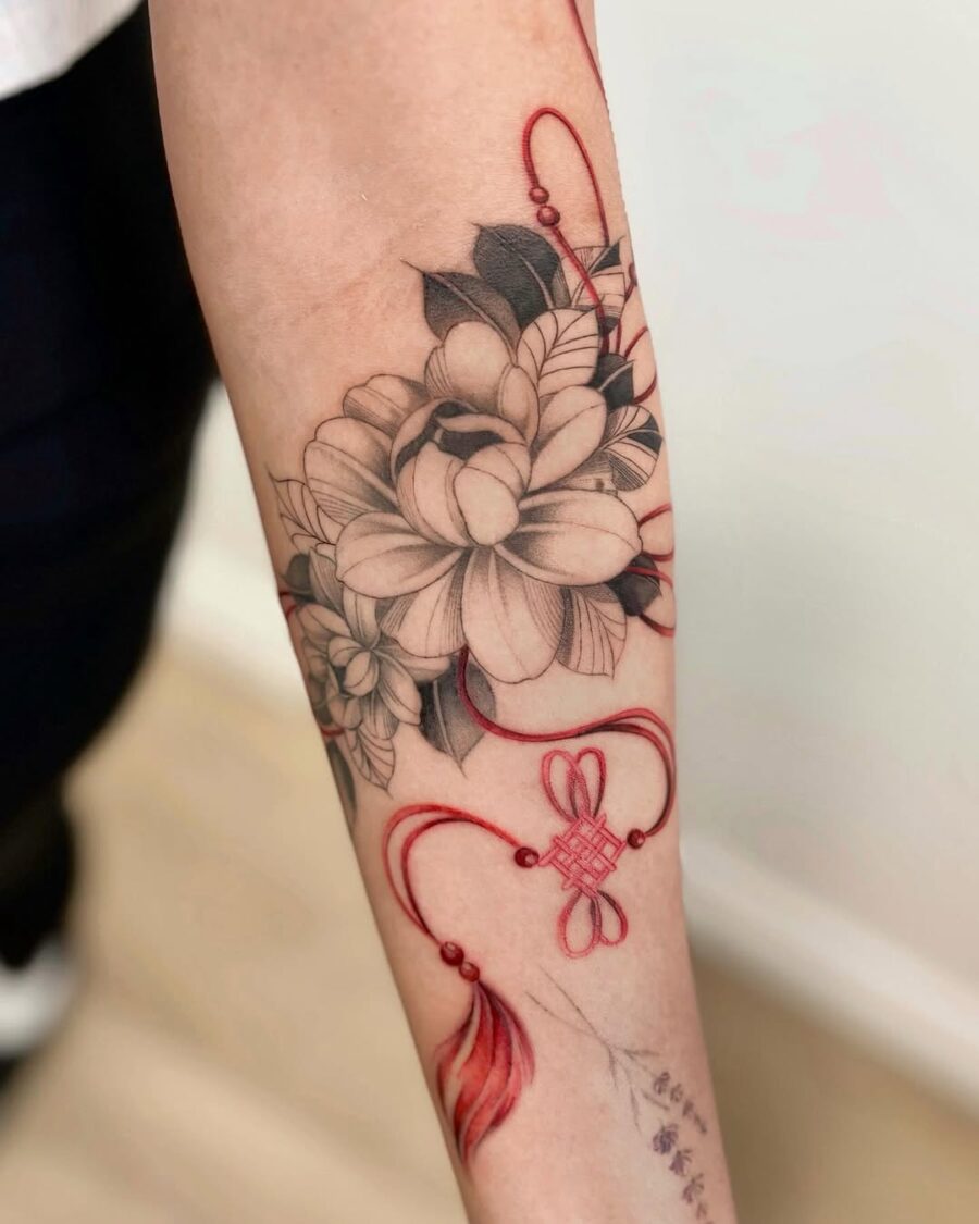 Delicate Sampaguita Tattoo with Red Accents Tattoo on skin