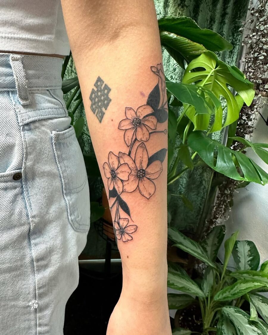 Elegant Sampaguita Floral Tattoo on the Arm Tattoo on skin