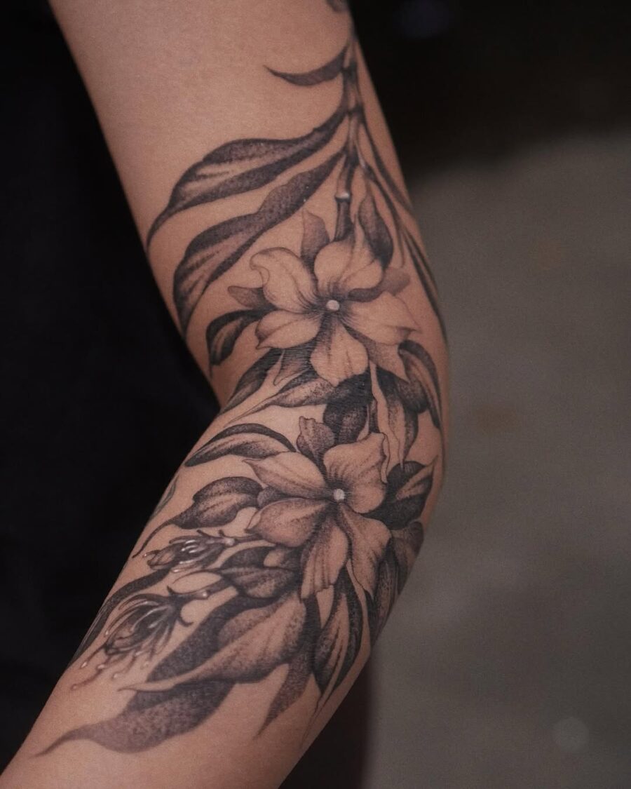 Elegant Sampaguita Flower Tattoo in Black and Gray Tattoo on skin