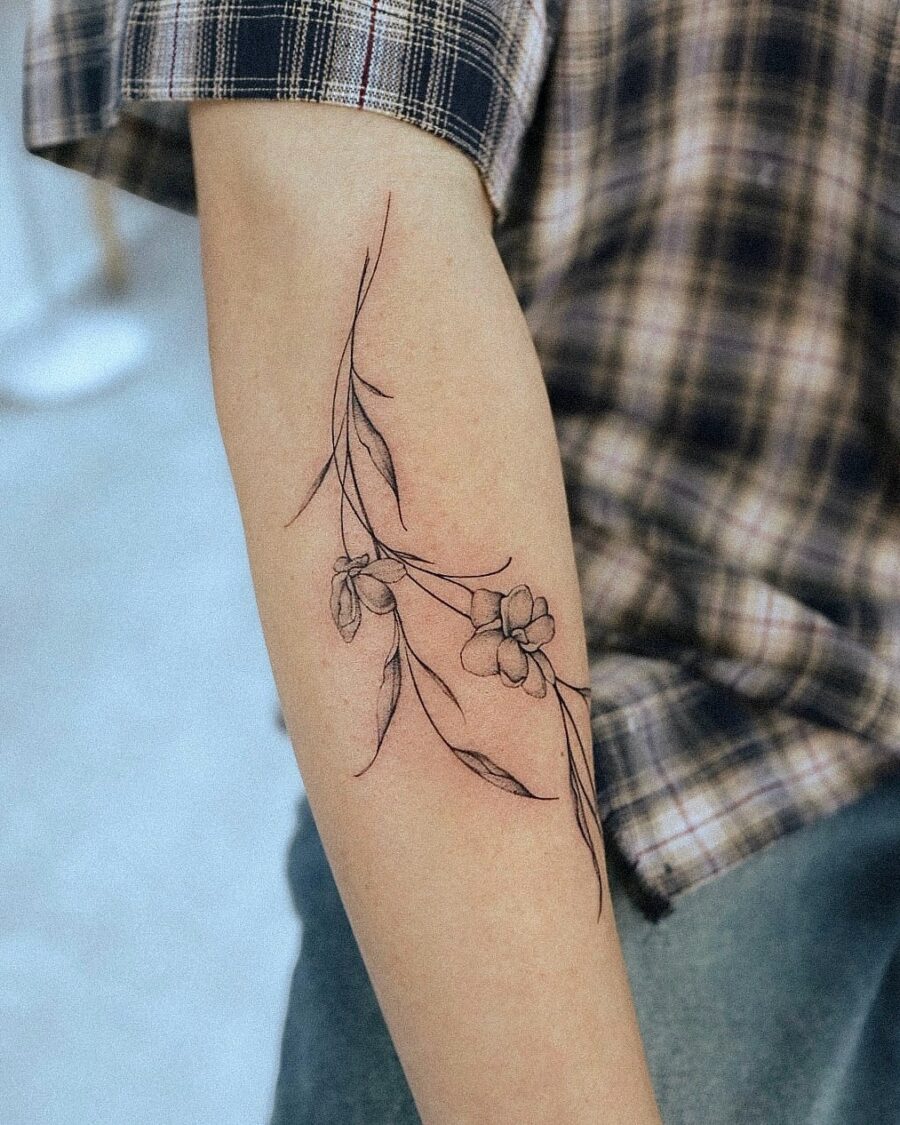 Elegant sampaguita tattoo with delicate floral details Tattoo on skin