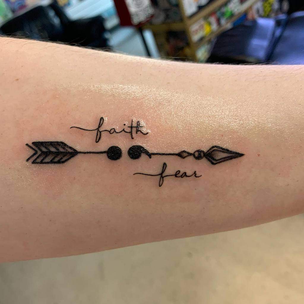 Arrow with a Semicolon and Words Semicolon Tattoos Tattoo on skin