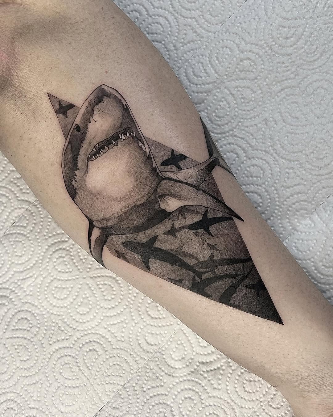 Bold Shark Tattoo with Artistic Elements shark tattoos