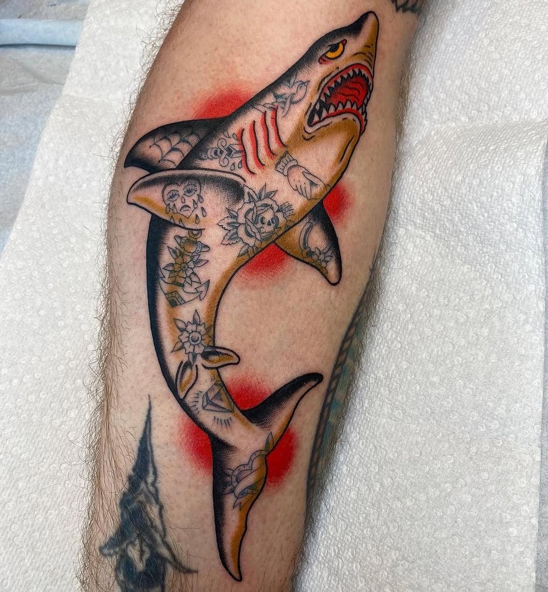 Bold shark tattoo with vibrant colors and details Tattoo on skin