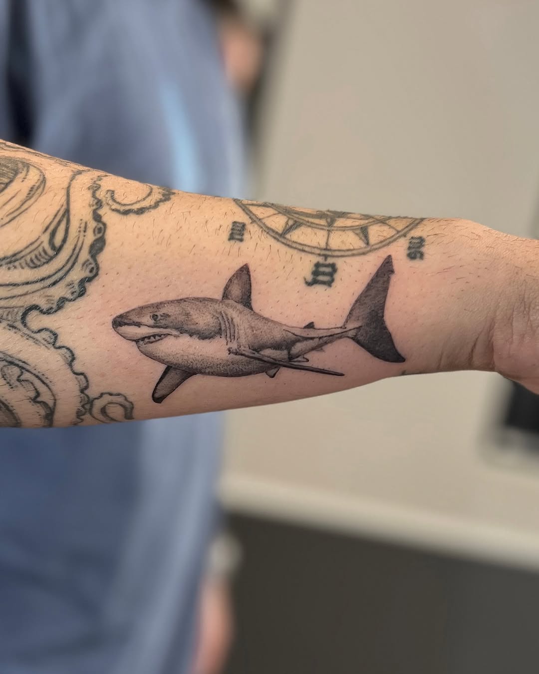 Dynamic Grey Shark Tattoo on Forearm Tattoo on skin