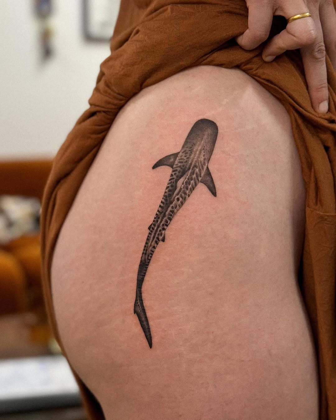 Elegant shark tattoo on the thigh Tattoo on skin