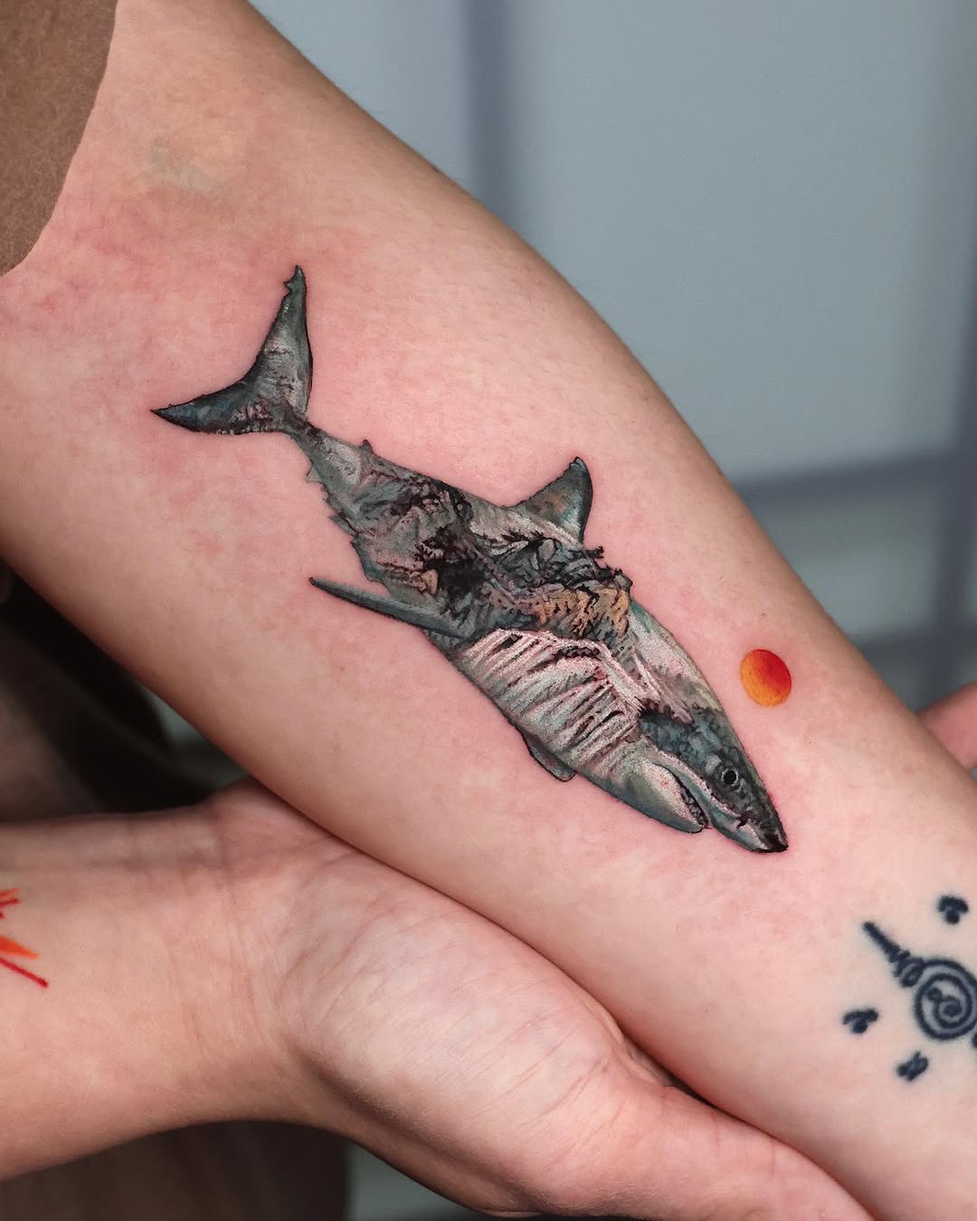 Intricate shark tattoo with vibrant colors Tattoo on skin
