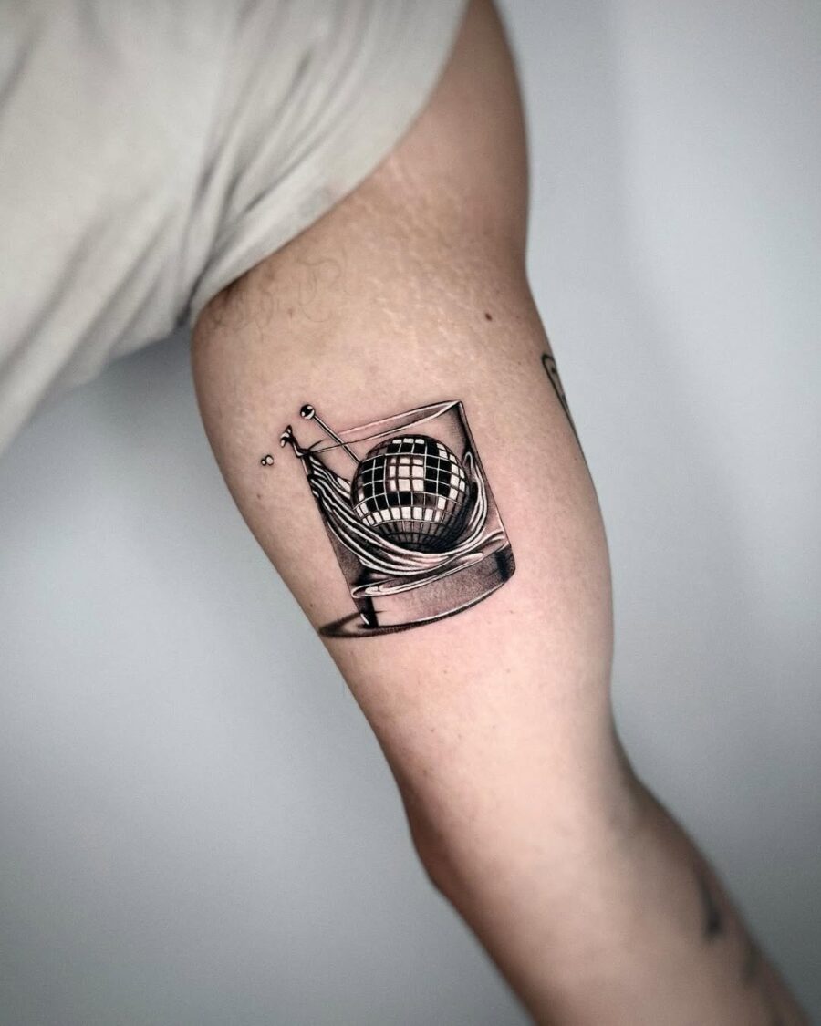 Distinctive Silver Ink Tattoo of a Splashing Glass Tattoo on skin