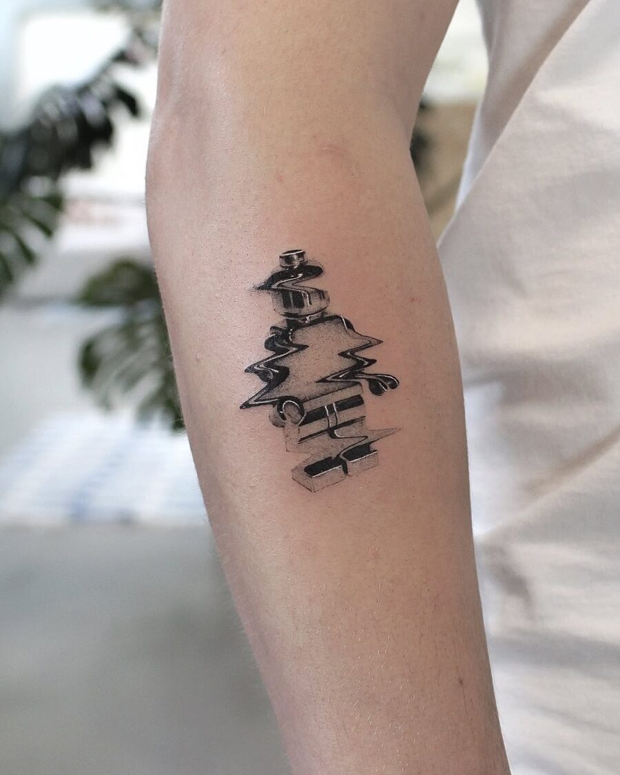 Elegant silver ink tree tattoo with fluid style Tattoo on skin