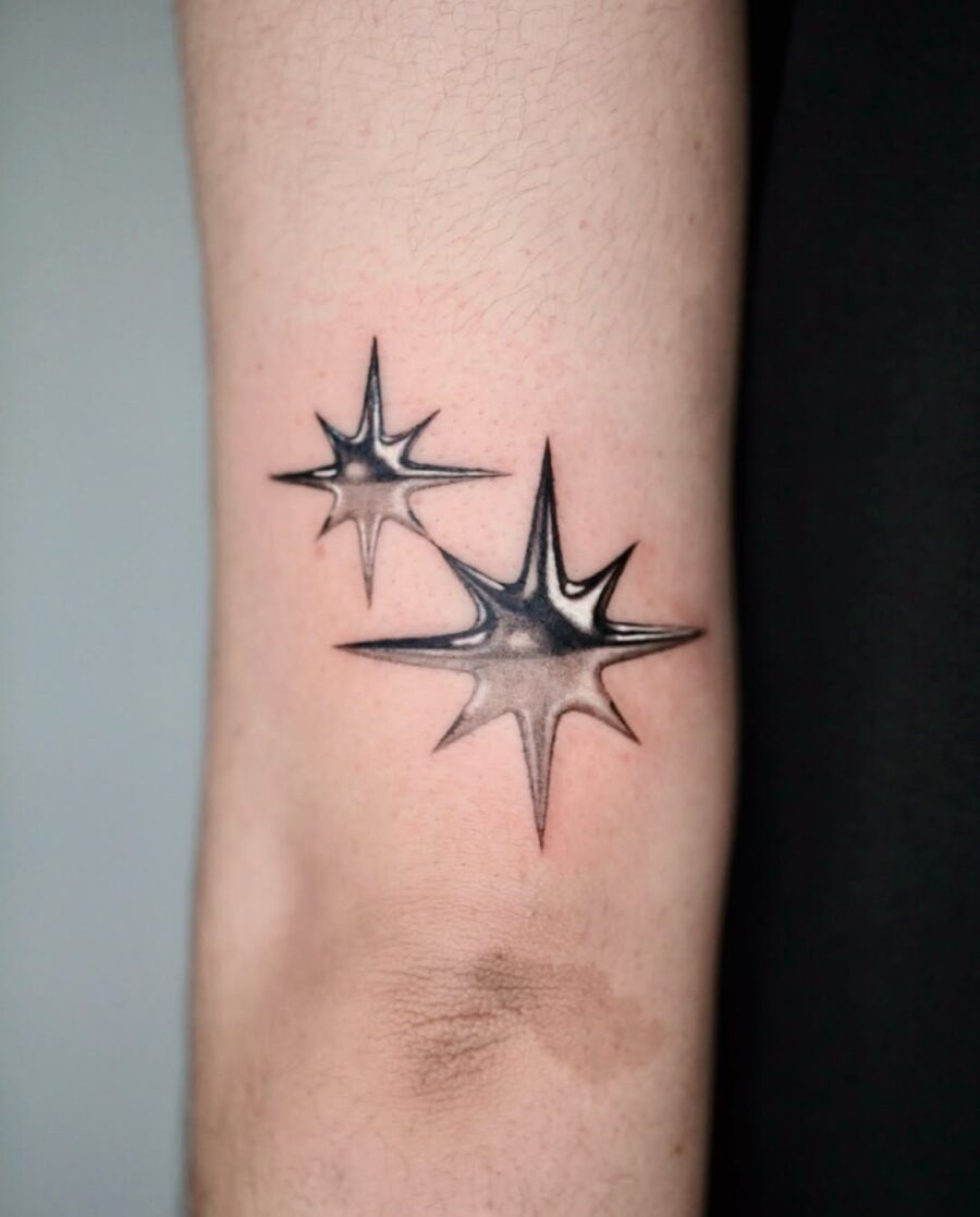 Striking Silver Ink Starburst Tattoos on Skin Tattoo on skin